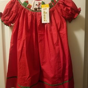 Smocking hand knitted and hand sewn santa design